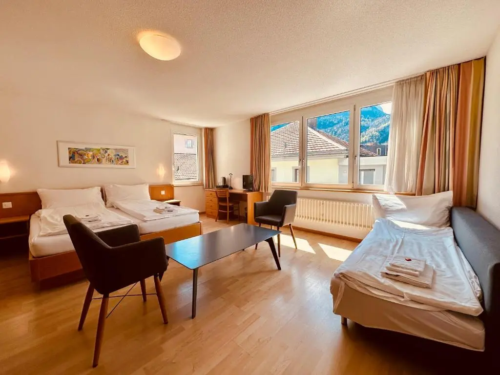 Prepared guest room at Hotel Rebstock Meiringen